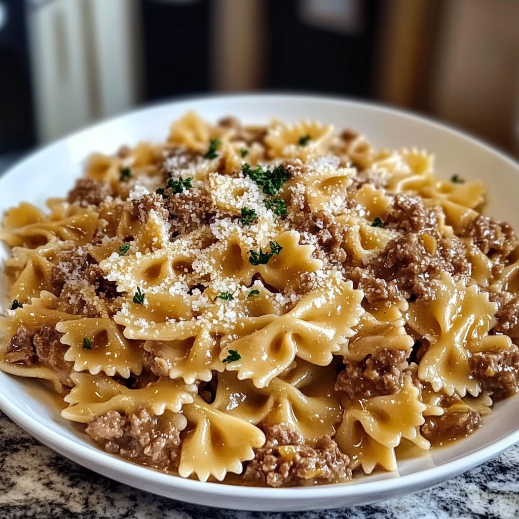 Recipe preparation for Creamy Parmesan Garlic Beef Bowtie Pasta