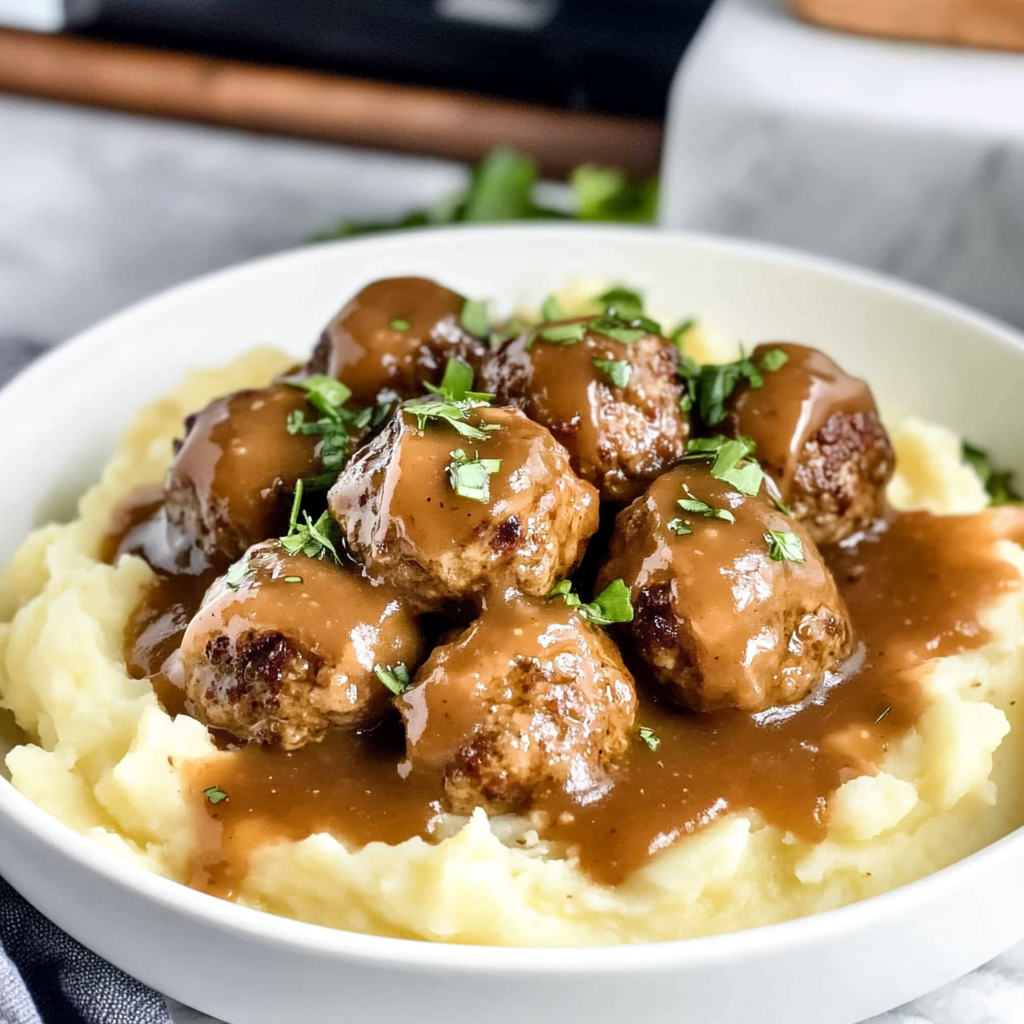 Recipe preparation for Salisbury Steak Meatballs with Garlic Herb Mashed Potatoes